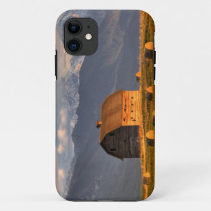 Old barn framed by hay bales and dramatic iPhone 11 case