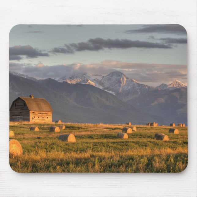 Old barn framed by hay bales and dramatic mouse pad (Front)