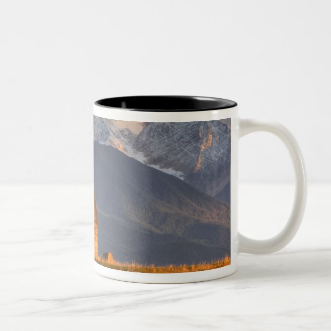 Old barn framed by hay bales and dramatic Two-Tone coffee mug (Right)