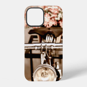Old bicycle and flowers blur in background process iPhone 12 case