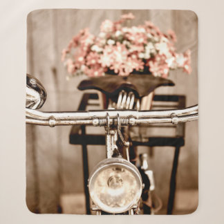 Old bicycle and flowers blur in background process sherpa blanket