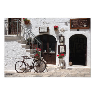 Old bike and storefront in Apulia Photo Print