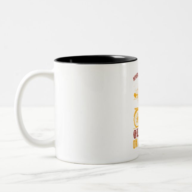 Old Biker Design | Bicycle | never underestimate  Two-Tone Coffee Mug (Left)