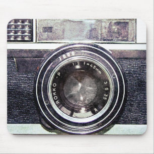 Old black camera mouse pad