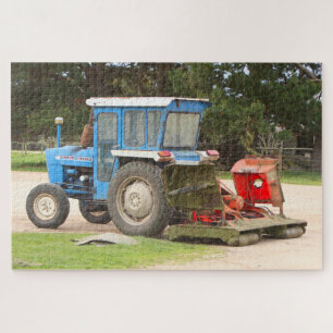 Old blue tractor with lawn mower, Australia Jigsaw Puzzle