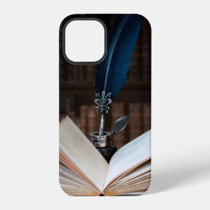 Old books, quill pen and vintage inkwell on wooden iPhone 12 case