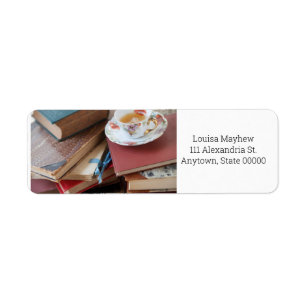 Old books with teacup return address label