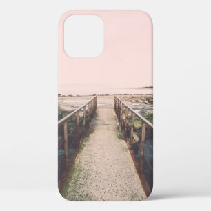 Old bridge with rusty metal rails near sea port. V iPhone 12 Case