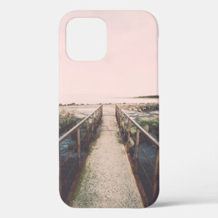 Old bridge with rusty metal rails near sea port. V iPhone 12 Case