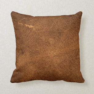 Old brown leather cushion