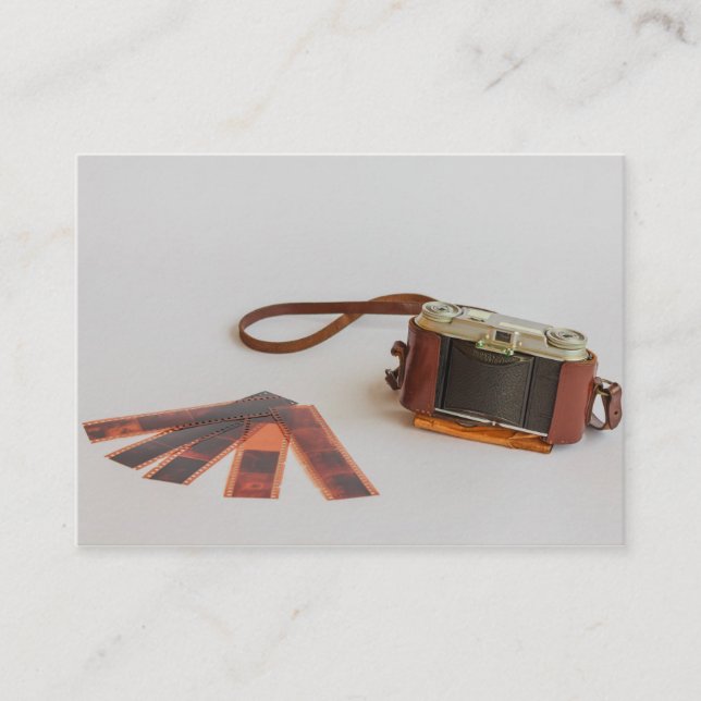 old camera with negative business card (Front)