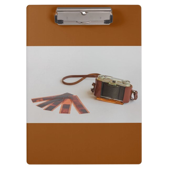 old camera with negative on   clipboard (Front)