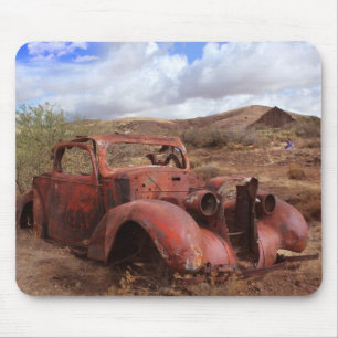 Old Car Rusting In Desert Landscape Mouse Pad