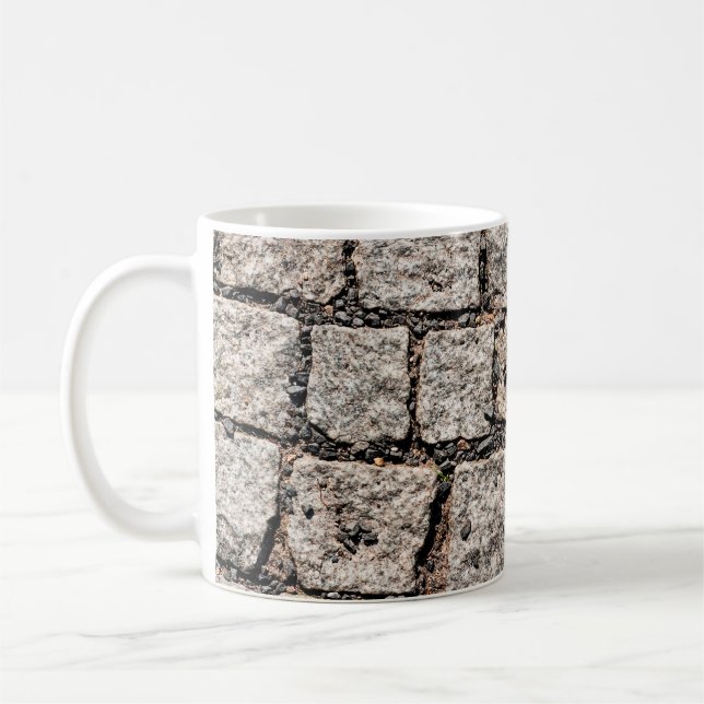 Old cobble stone pattern at the streetabstract,anc coffee mug (Left)