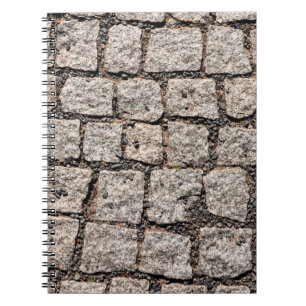 Old cobble stone pattern at the streetabstract,anc notebook
