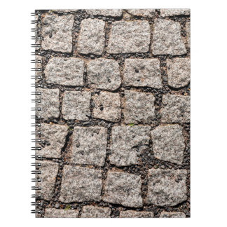Old cobble stone pattern at the streetabstract,anc notebook