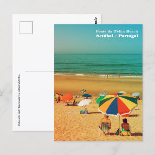 Old couple under beach umbrella in Fonte da Telha. Postcard