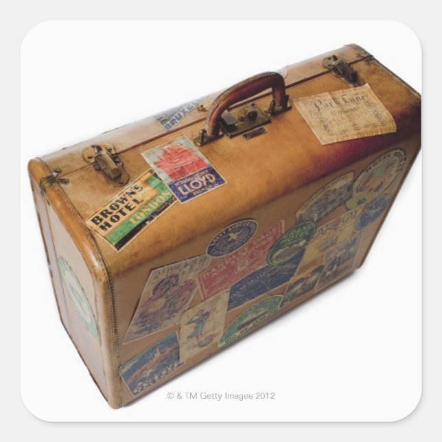 old fashioned suitcase with travel stickers (Front)