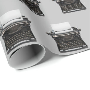 old-fashioned typewriter on grey wrapping paper