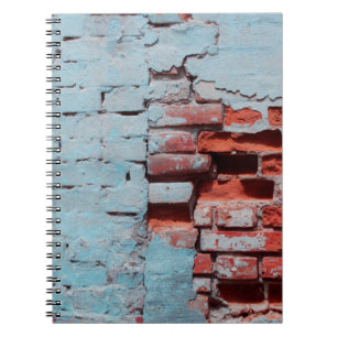 Old grungy brick wall with natural defects. Scratc Notebook