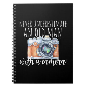 Old Man With A Camera Notebook