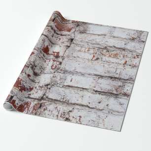 Old painted brick wall with peeling white paintwal wrapping paper