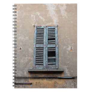 Old ruined wooden window of old houseancient,antiq notebook