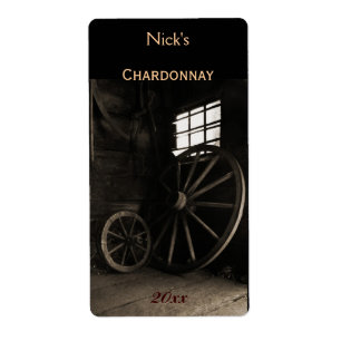 Old rustic wheels wine bottle label