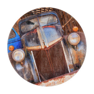 Old rusty truck on a farm cutting board