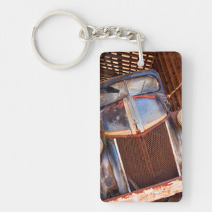 Old rusty truck on a farm key ring