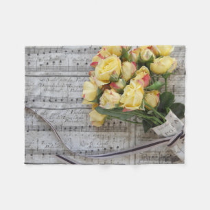 Old sheet music with yellow roses fleece blanket