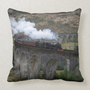 Old steam train on Glenfinnan Viaduct Cushion