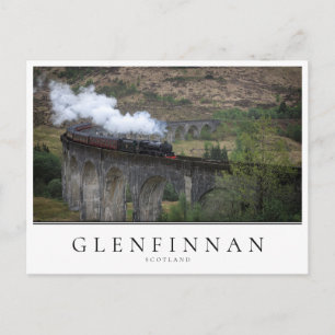 Old steam train on Glenfinnan Viaduct Postcard
