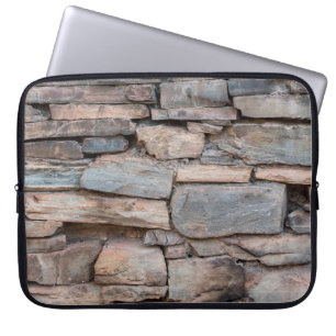 Old stone wall texture backgroundabstract, antique laptop sleeve