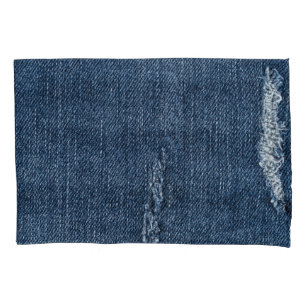 Old torn denim: jeans texture. pillowcase