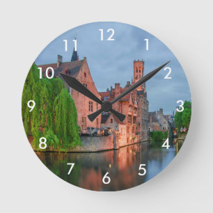 Old town and Belfry tower at night in Bruges Round Clock