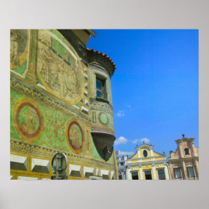 Old town square surrounded by 16th-century poster