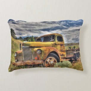 Old truck abandoned in field decorative cushion