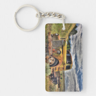 Old truck abandoned in field key ring