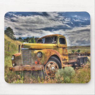 Old truck abandoned in field mouse pad