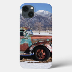Old truck sitting in the field iPhone 13 case