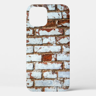 Old vintage brick wall with sprinkled white plaste iPhone 12 case