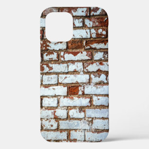 Old vintage brick wall with sprinkled white plaste iPhone 12 case