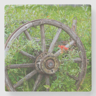 Old wagon wheel in historic old gold town 3 stone coaster