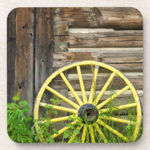 Old wagon wheel in historic old gold town coaster