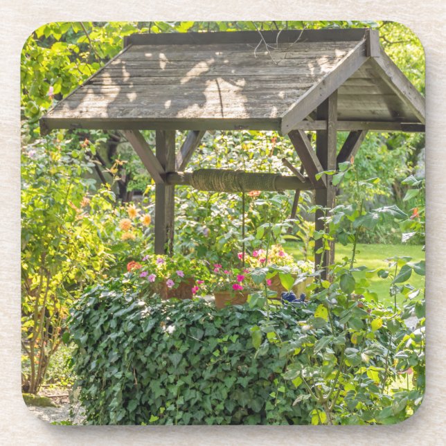 Old well in a garden hard plastic coasters (Front)
