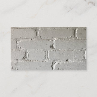 Old white brick wall with nooks and crannies business card
