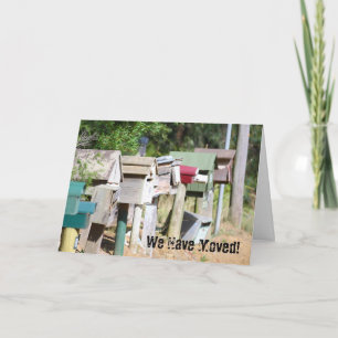 Old wooden aged letter boxes for  We have moved! Announcement