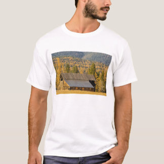 Old wooden barn with autumn tamaracks near T-Shirt