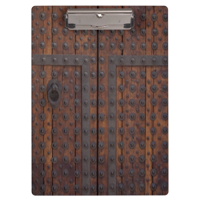 Old Wooden Door With Black Metal Reinforcements Clipboard (Front)